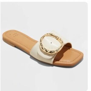 Women's Bennie Buckle Slide
Sandals with Memory Foam Insole
- A New Day new